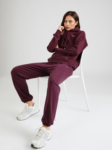 DKNY Performance - Tapered Calças de desporto em roxo