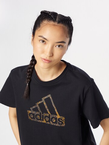 ADIDAS SPORTSWEAR - Camiseta funcional 'Reptile Badge of Sport Graphic' en negro