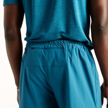 new balance Regular 'RC Essential Short 7"'. in Blau