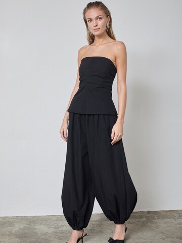 Tapered Pantaloni modello harem 'Acasia' di co'couture in nero
