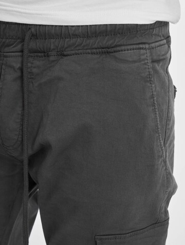 Tapered Pantaloni eleganți 'Litra Antifit' de la DEF pe gri