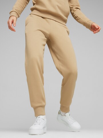 PUMA Tapered Sports trousers 'Essentials' in Brown