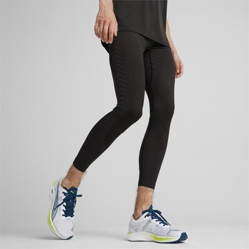 PUMA Skinny Workout Pants in Black: front