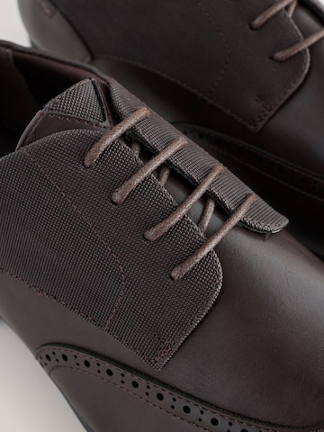 Next Čevlji na vezalke | rjava barva