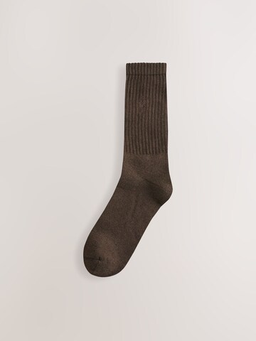 Next Sukat värissä beige