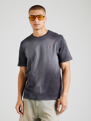 DIESEL T-shirt 'ADJUST-R15' i svart: framsida
