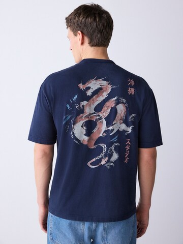 Next Shirt in Blau: Vorderseite