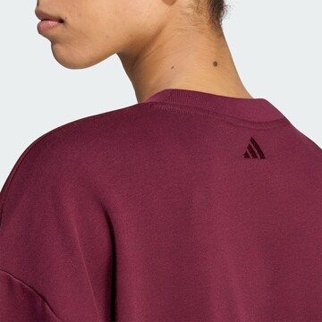 ADIDAS SPORTSWEAR Urheilullinen collegepaita 'Seasonal Essentials' värissä punainen