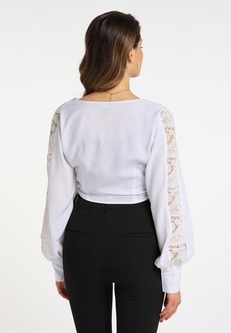 Camicia da donna di faina in bianco