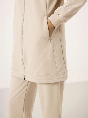 Tuta da jogging di Tommy Life in beige