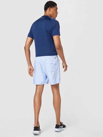 Nike Sportswear Normalny krój Spodnie 'Essentials' w kolorze niebieski