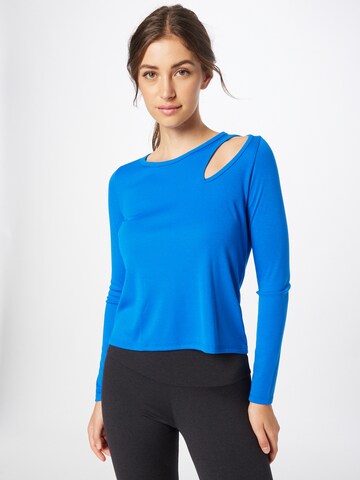 Onzie Performance Shirt in Blue: front