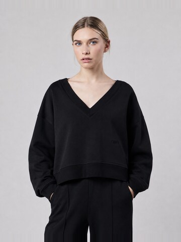 OWN Off With NatureSweater majica 'Felpa Scollo a V Loose Fit in Interlock Black' - crna boja