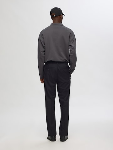 Regular Pantalon à plis 'SLHLEROY' SELECTED en noir