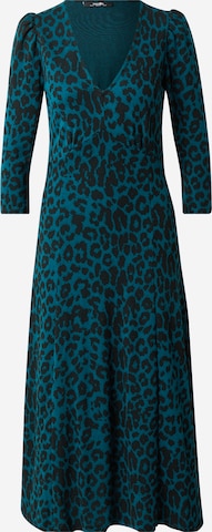 Wallis Curve Stickad klänning i blå: framsida