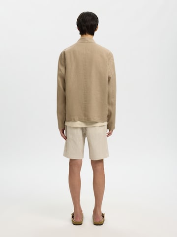 SELECTED Tussenjas in Bruin