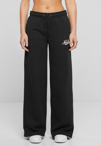 Karl Kani Wide leg Pants in Black: front