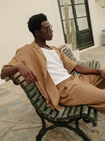 DAN FOX APPAREL Tapered Pants 'Gino' in Brown