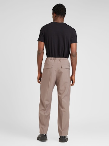 WEEKDAY Regular Trousers with creases 'Axel' in Brown