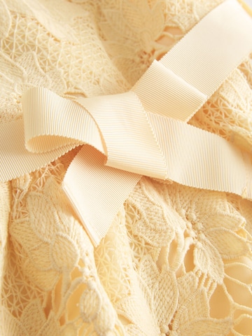 Next - Vestido en amarillo