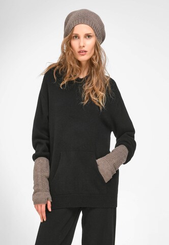 Pull-over include en noir : devant