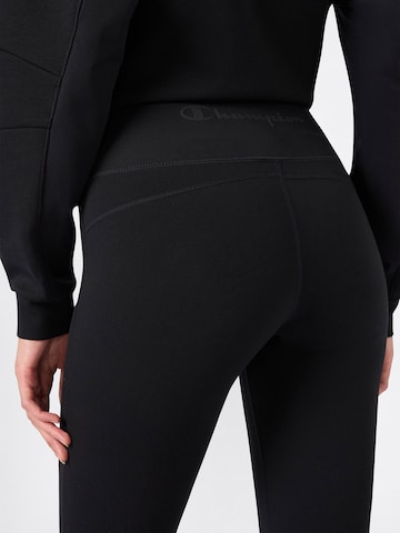 Champion Authentic Athletic ApparelFlared/zvonoliki kroj Sportske hlače - crna boja