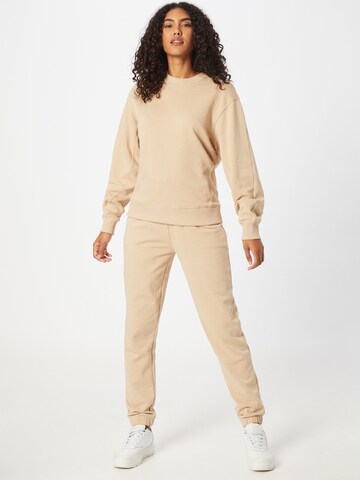 Tapered Pantaloni 'Suzi' di ABOUT YOU Limited in beige