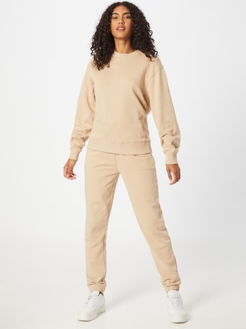 ABOUT YOU Limited Tapered Hose 'Suzi' (GOTS) in Beige