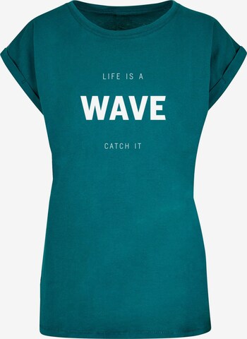 Merchcode Shirt 'Summer - Life is a wave' in Green: front