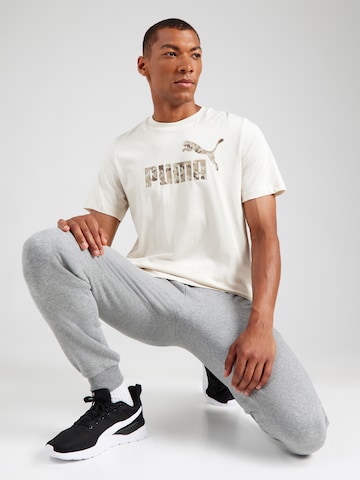 PUMA Функциональная футболка 'ESS' в Бежевый: спереди