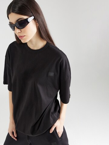 ALPHA INDUSTRIES T-Shirt 'Alpha Essentials' in Schwarz