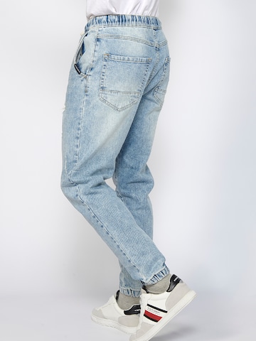 KOROSHI Tapered Jeans i blå