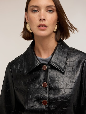 MOTIVI Between-season jacket in Black
