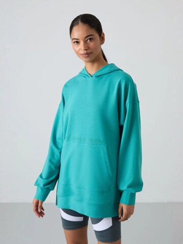 Tommy Life Sweatshirt in Green: front