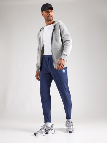 Effilé Pantalon Nike Sportswear en bleu