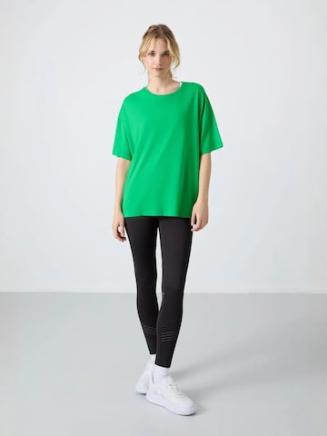 Maglietta di Tommy Life in verde: frontale
