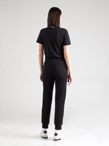 Champion Authentic Athletic Apparel Tapered Trousers in Black