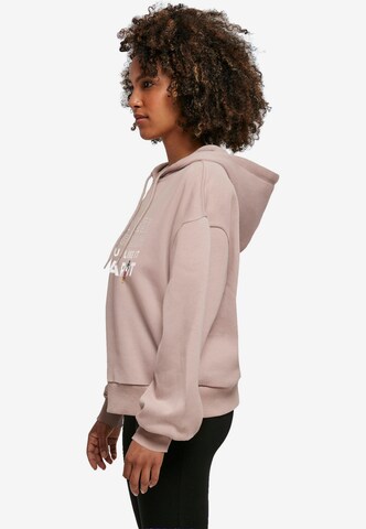 Merchcode Sweatshirt 'Peanuts - If you like it wear it' in Roze