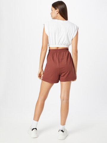 ABOUT YOU Loose fit Trousers 'Marina' in Brown