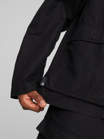 PUMA Between-Season Jacket in Black