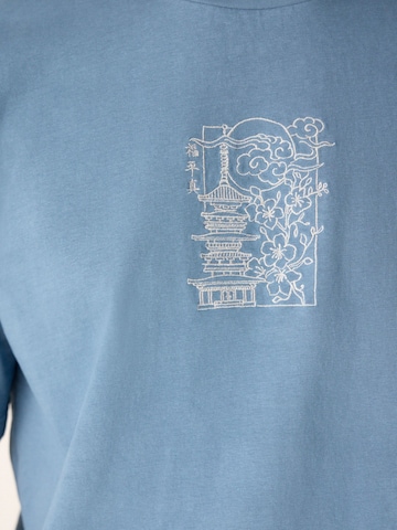 T-Shirt Next en bleu