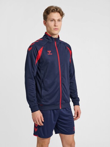 Veste de survêtement Hummel en bleu : devant