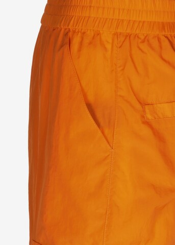 Karl Kani Loosefit Cargobroek in Oranje