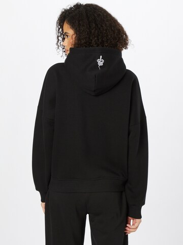 ABOUT YOU x INNA Sweatshirt 'Alessia' in Black