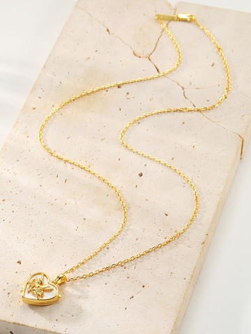 Hey Happiness - Cadena 'Cupid Heart Locket' en oro