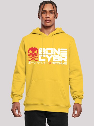 Sweat-shirt 'Bone Cyber' F4NT4STIC en jaune : devant