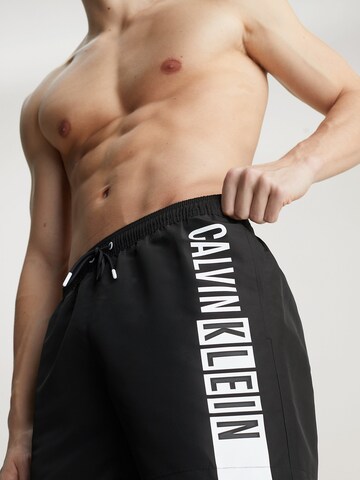 juoda Calvin Klein Swimwear Maudymosi trumpikės 'Intense Power'