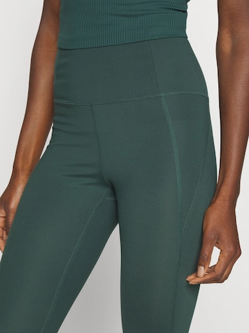 Girlfriend Collective Skinny Sportovní kalhoty ' Compressive ' – zelená
