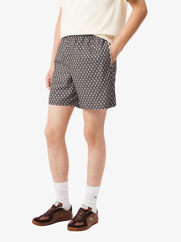 Loosefit Pantalon LACOSTE en beige : devant