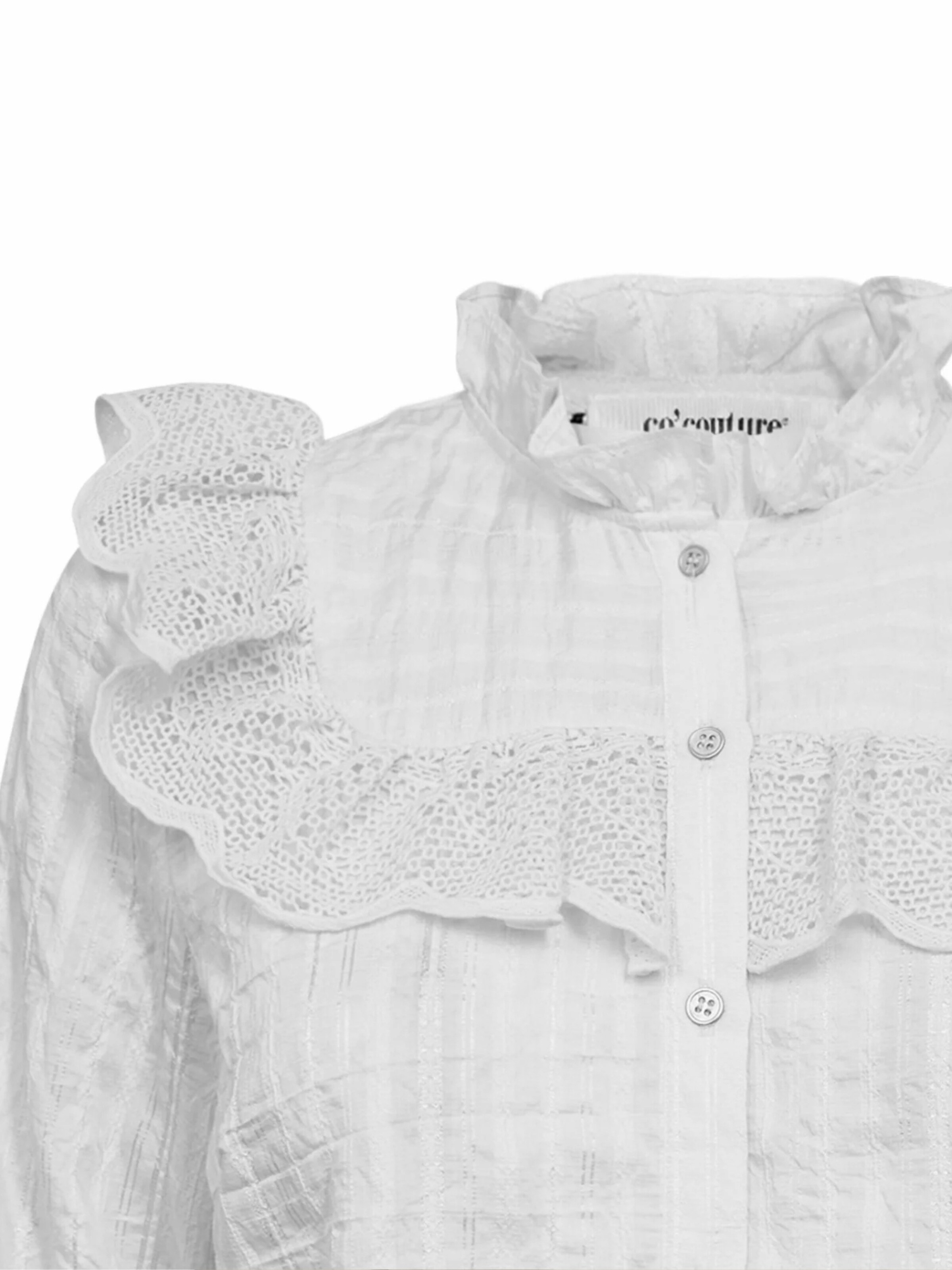 Chemisier 'Tune' co'couture en blanc